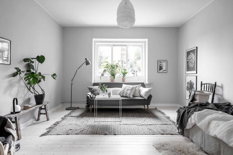 Estudio de 32 metros² con decoración minimalista en gris